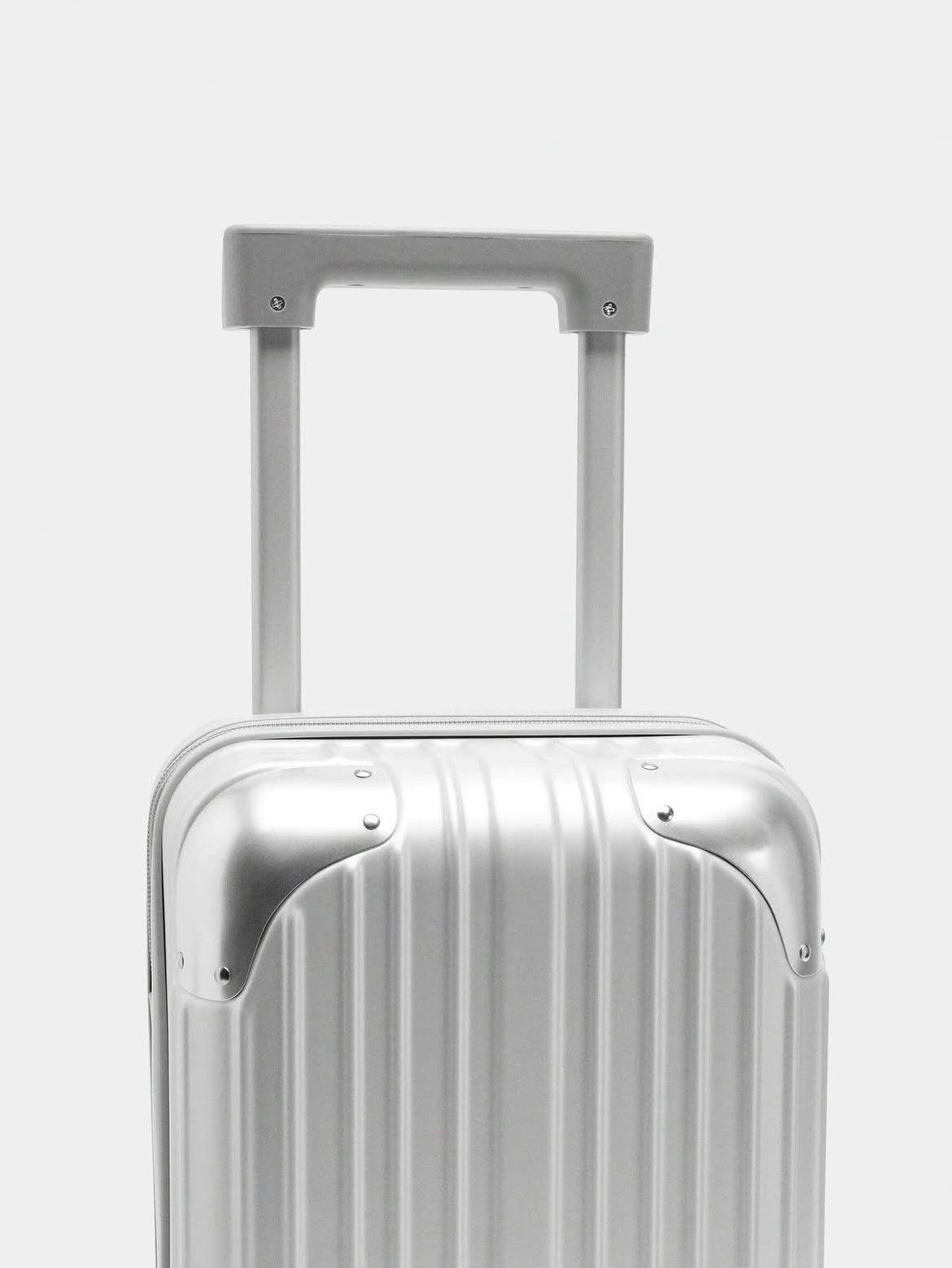 Valise à roulettes avec texture XS