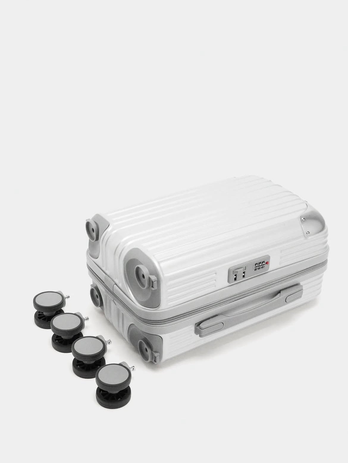 Valise à roulettes avec texture XS