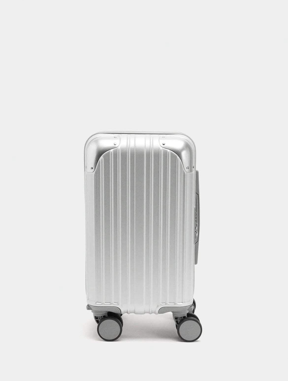 Valise à roulettes avec texture XS